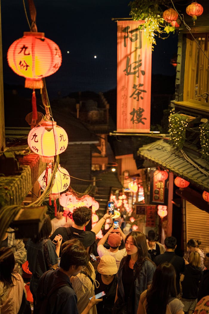 Home Explore the bustling nightlife and illuminated lanterns of Jiufen